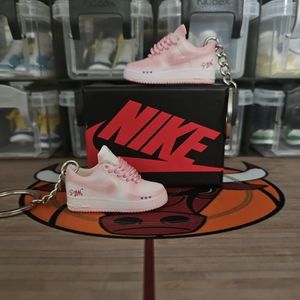 Nike Air Force 1 pair of mini sneakers keychain.